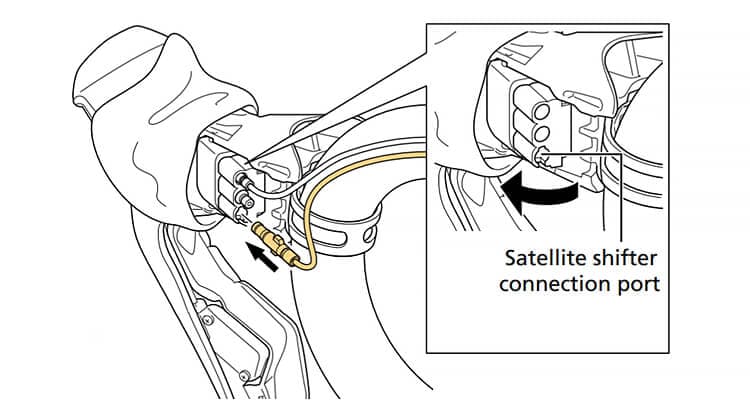 Connect satellite shifters to the bottom port of the shift lever