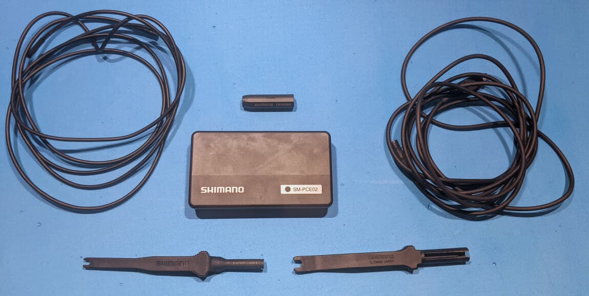 The SM-PCE02 with link cables and EW-AD305