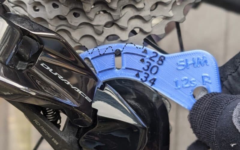 Set the b-gap distance using the GG adjustment gauge