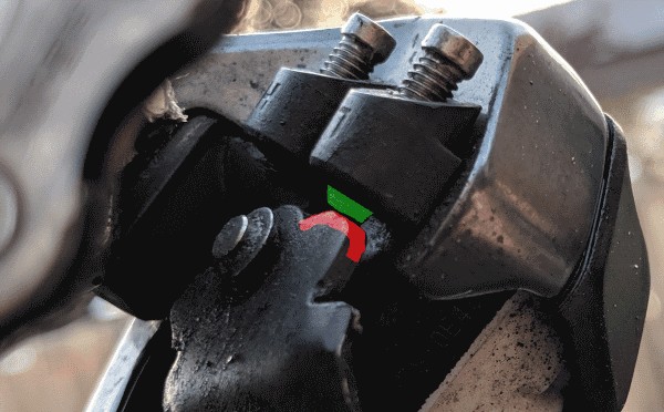 Adjust the low limit stopper bolt