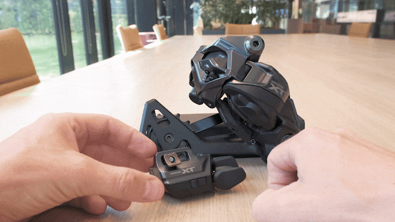 Release and then hold the buttons again. The LED will flash, indicating you have just paired a shifter